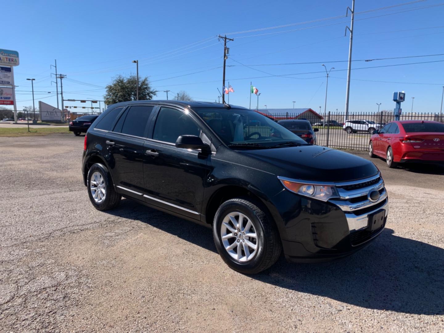 2013 Black /Tan Ford Edge (2FMDK3GC5DB) with an V6 - 3.5L 3496cc 213ci GAS MFI vin C - 4 valve DOHC engine, AUTOMATIC transmission, located at 1830 North Belt Line Road, Irving, TX, 75061, (469) 524-0199, 32.834373, -96.993584 - Photo#6